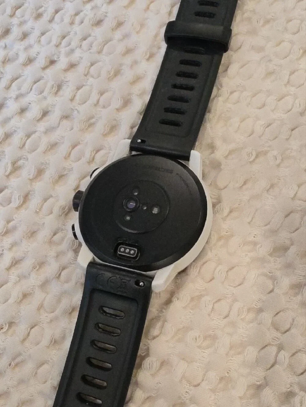 Coro APEX Pro Smartwatch in White with Black Band